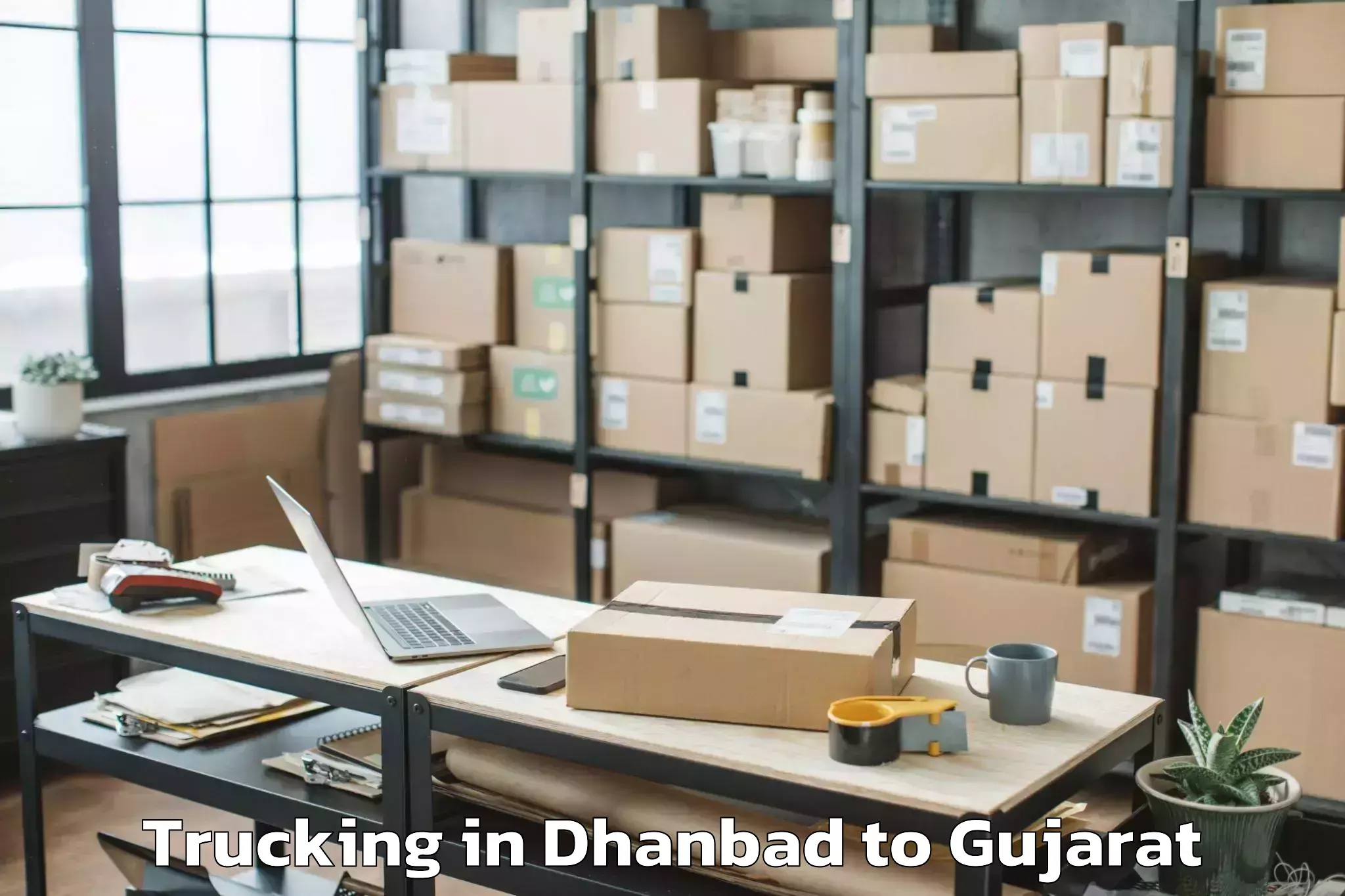 Affordable Dhanbad to Talod Trucking